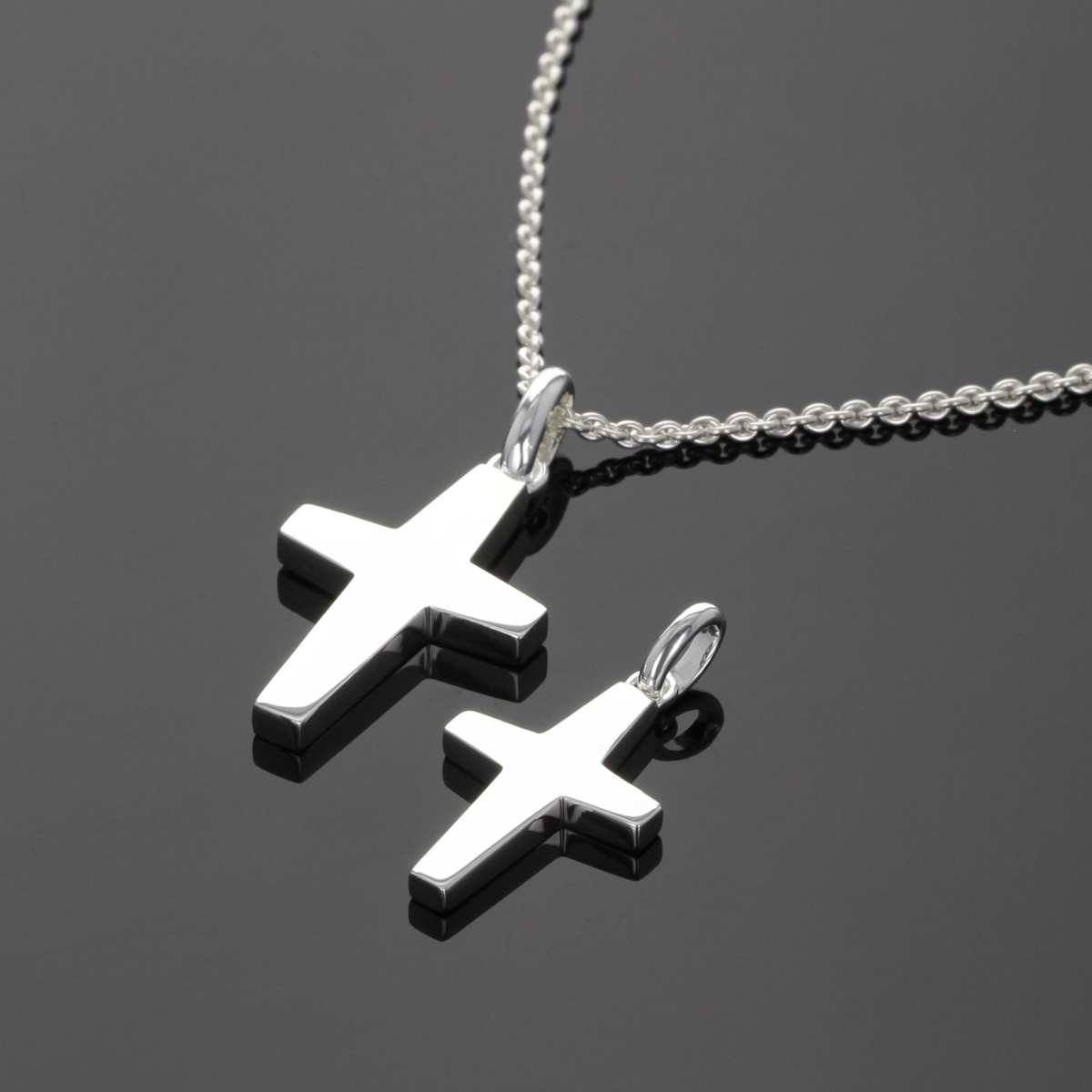 Polished sterling silver cross pendants