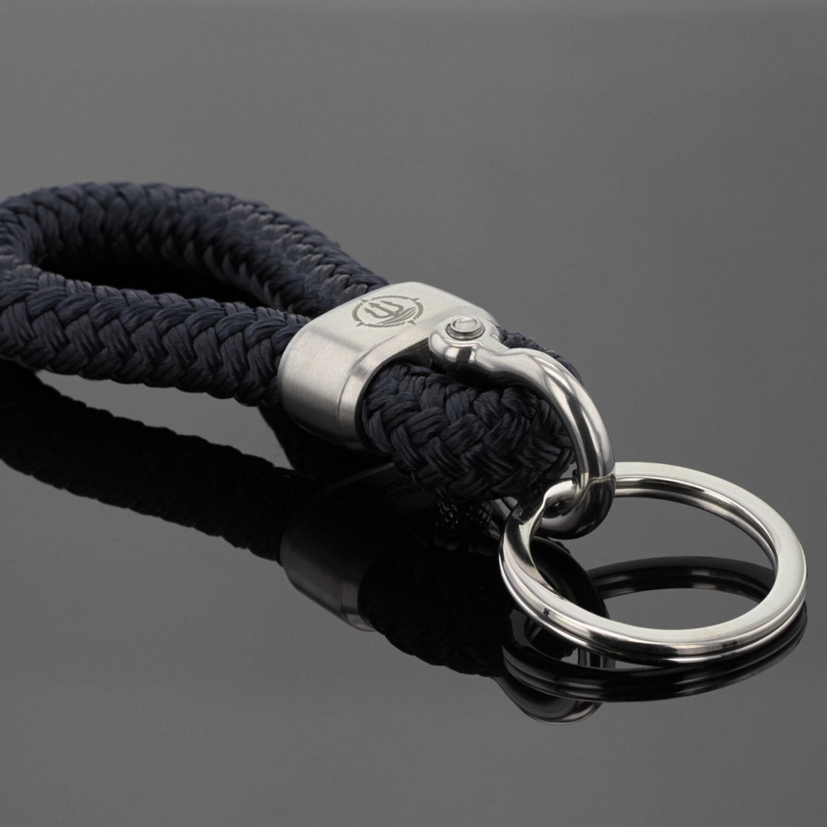 Keychain made of dark blue marine rope and stainless steel.