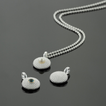 Mini dotted pendants in silver