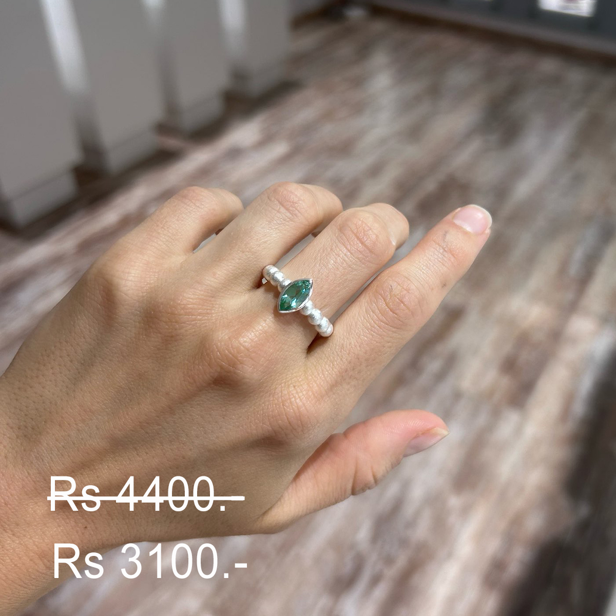 Discounted turquoise zirconia ring