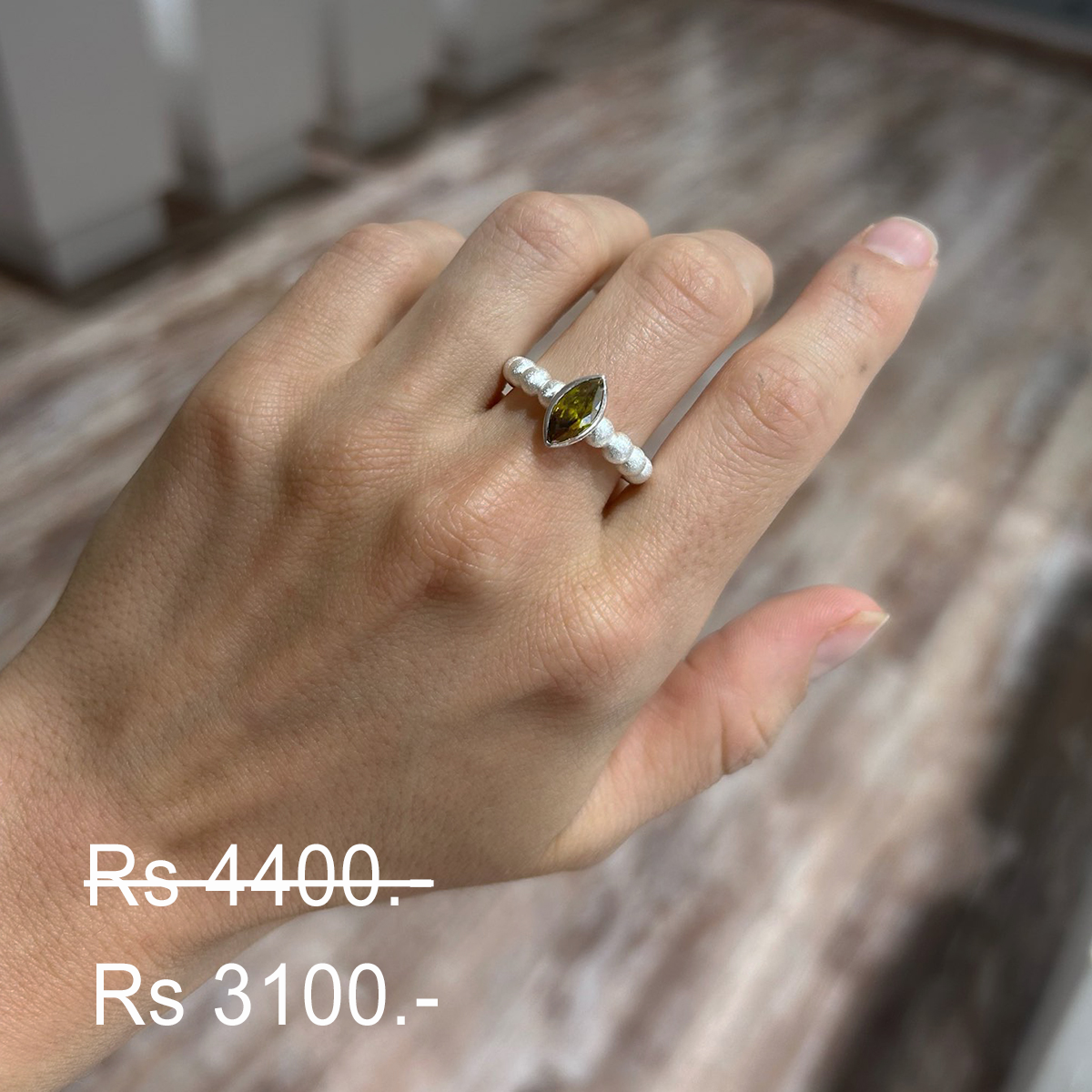 Discounted olive zirconia ring