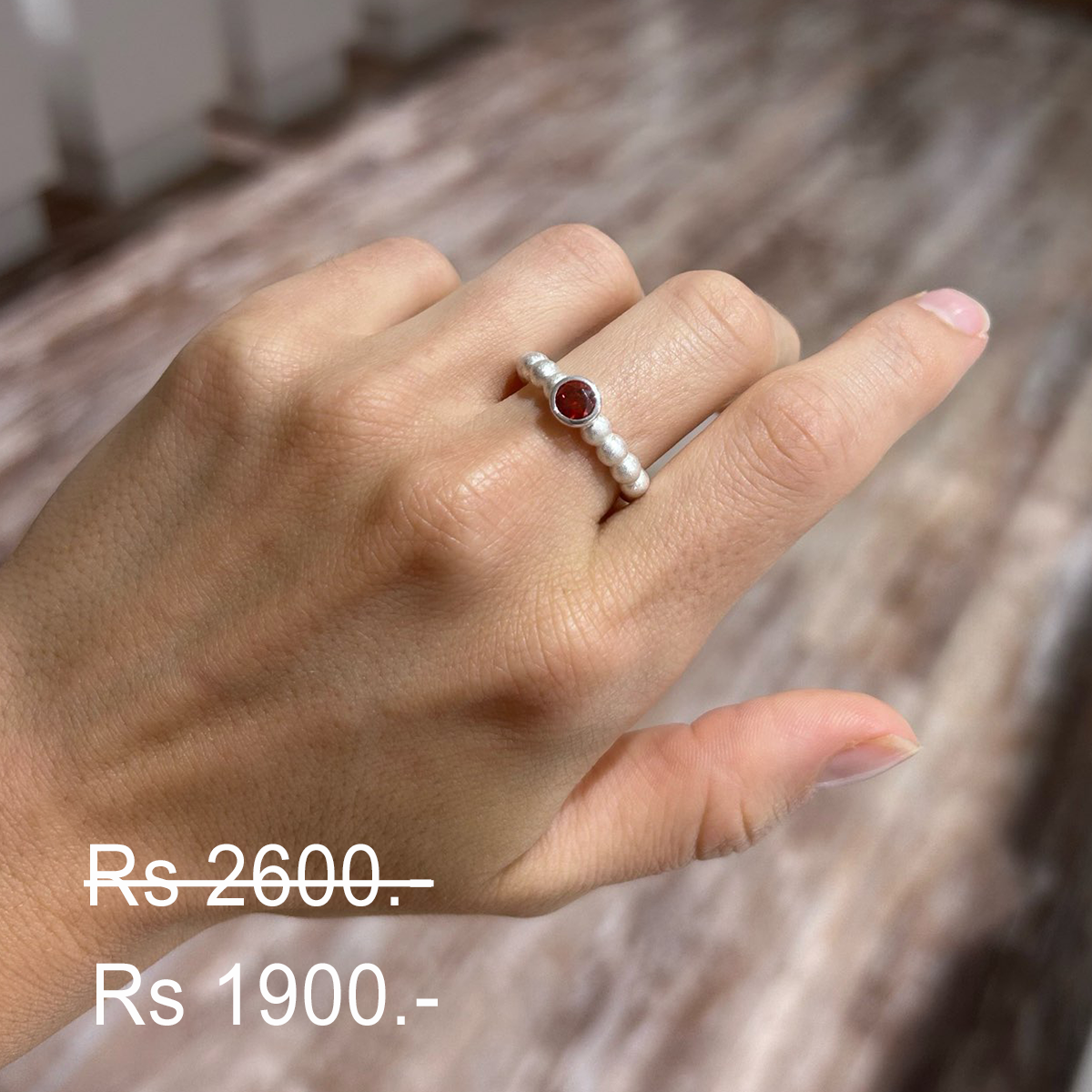Discounted red zirconia ring