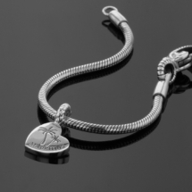 Silver Mauritius souvenir charm with palm trees Heart charm in polished silver with a Mauritius and palm tree engraving