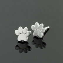 Petite paw earrings in a matted silver