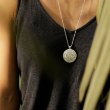 Statement pendant in silver with rock texture