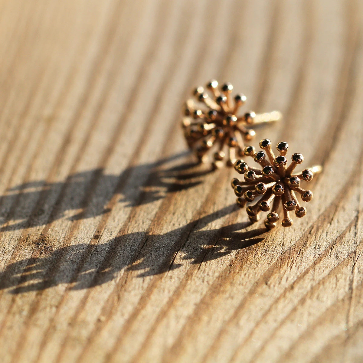 Dandelion earrings in rose gold