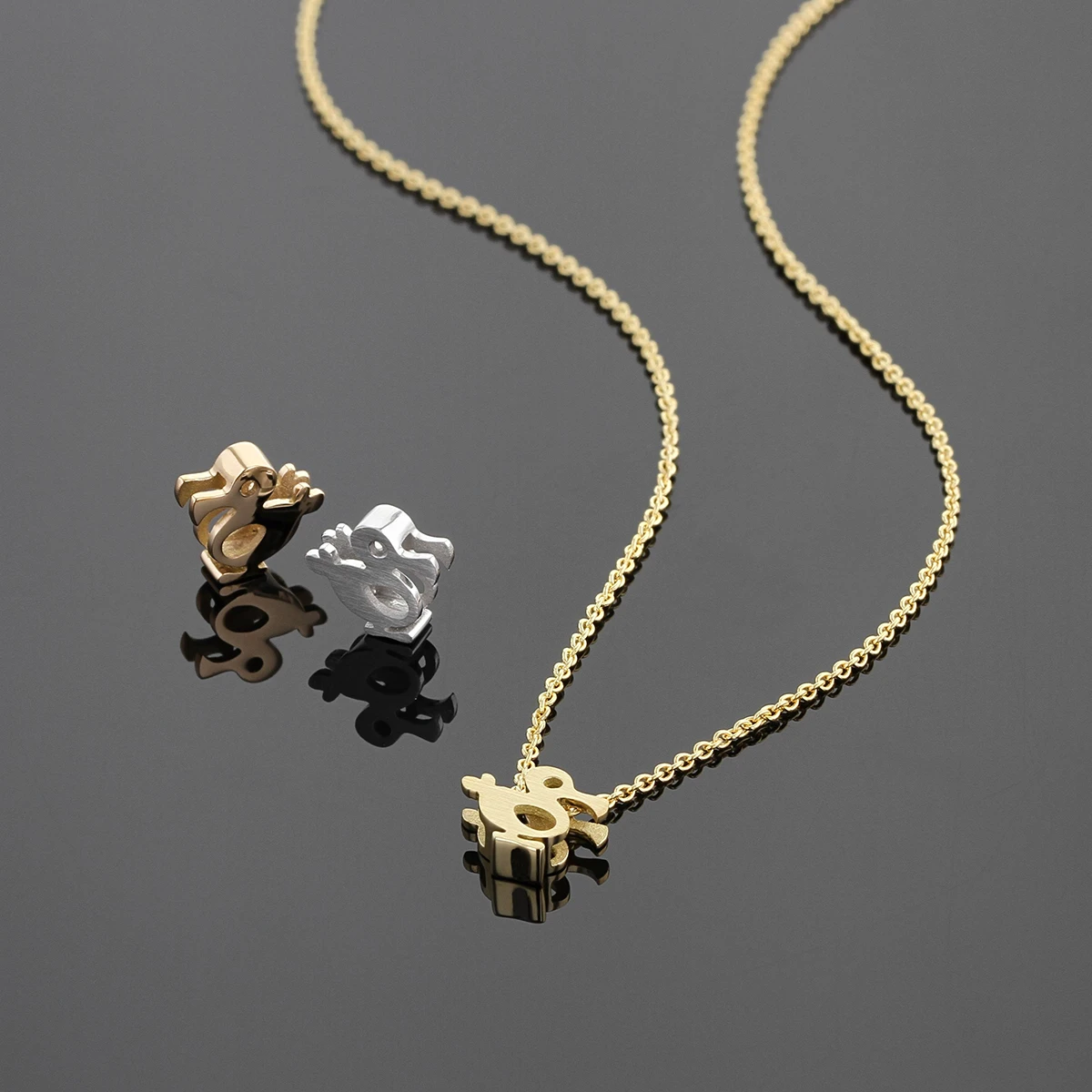 Petite dodo pendants in gold