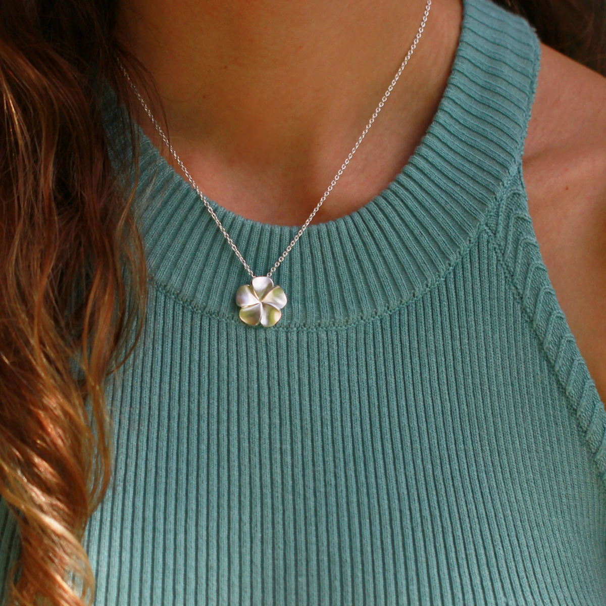 Small silver hibiscus flower pendant