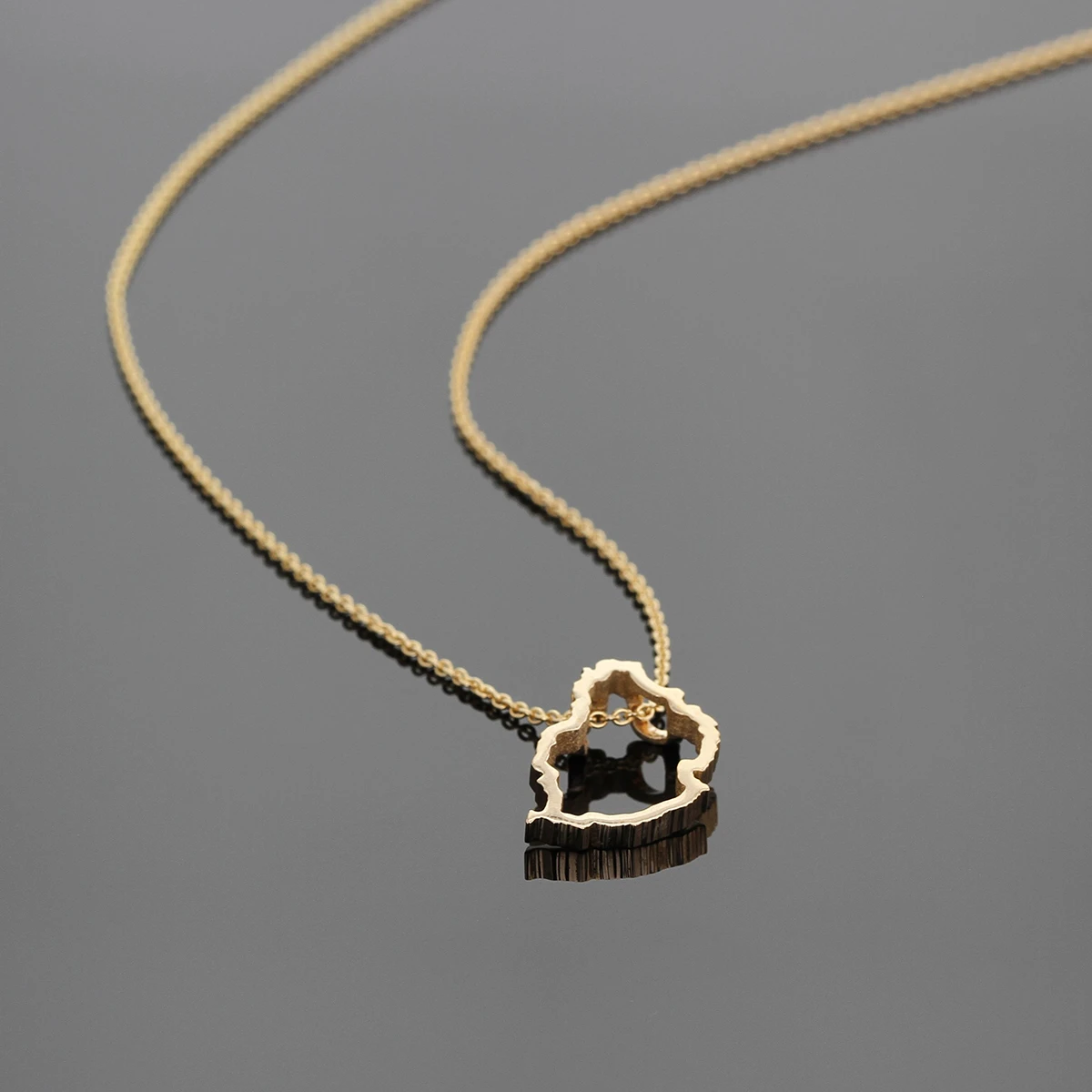 Rose gold Mauritius map pendant