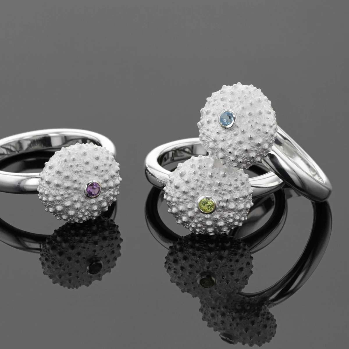 Sea urchin rings in silver with precious stones