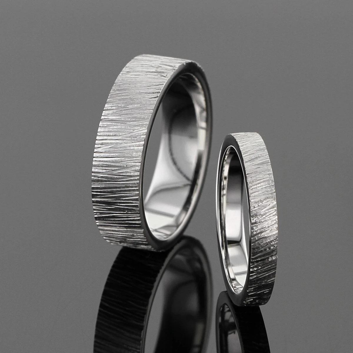 White gold wedding bands with organic rills all around