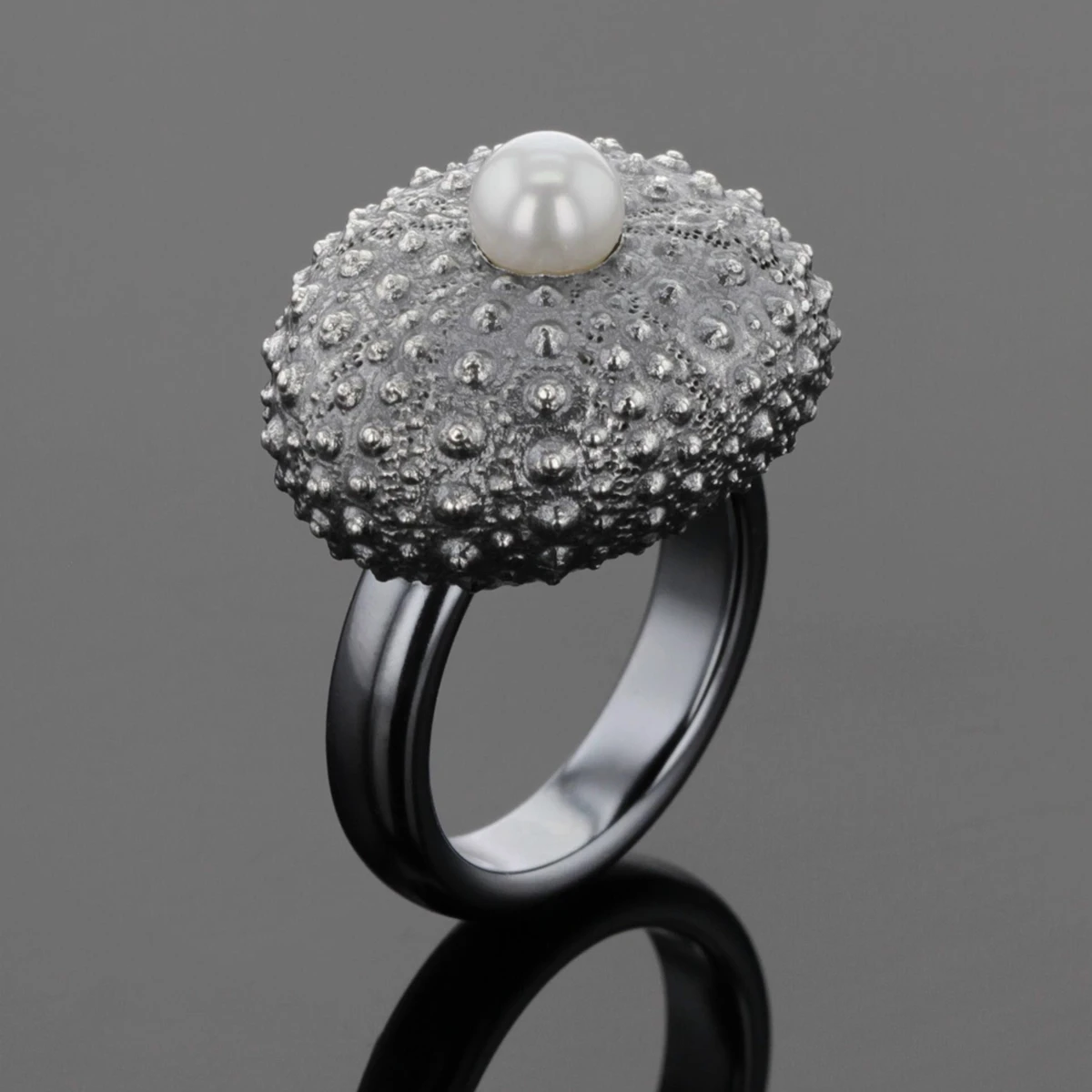 Black sea urchin ring with a freshwater pearl