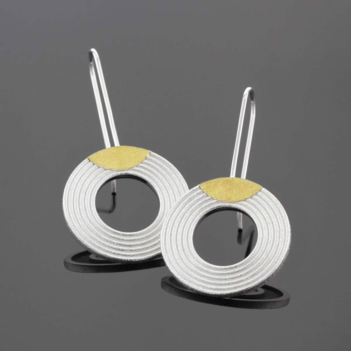 Modern silver with gold earrings Mauritius