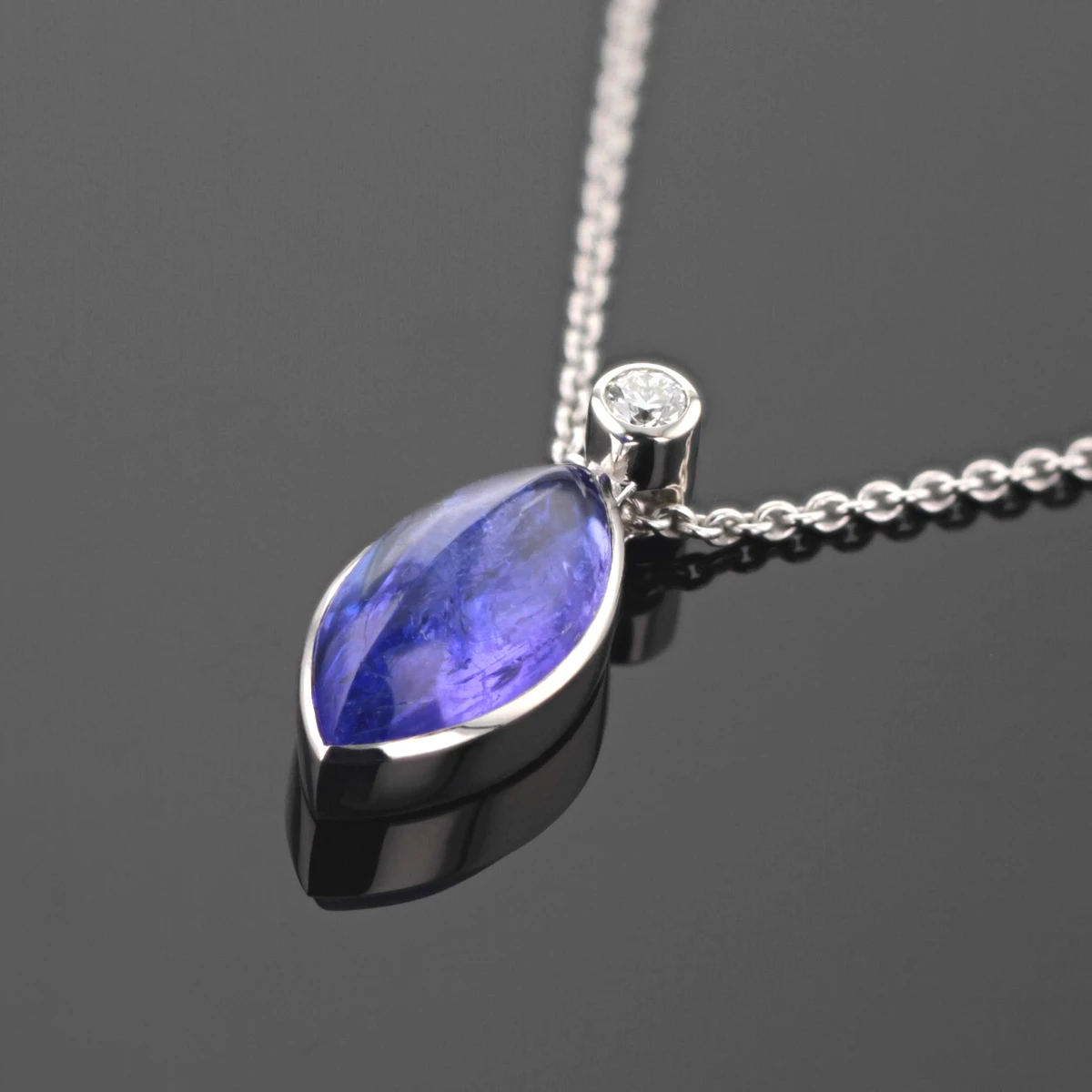 Tanzanite and diamond pendant in white gold