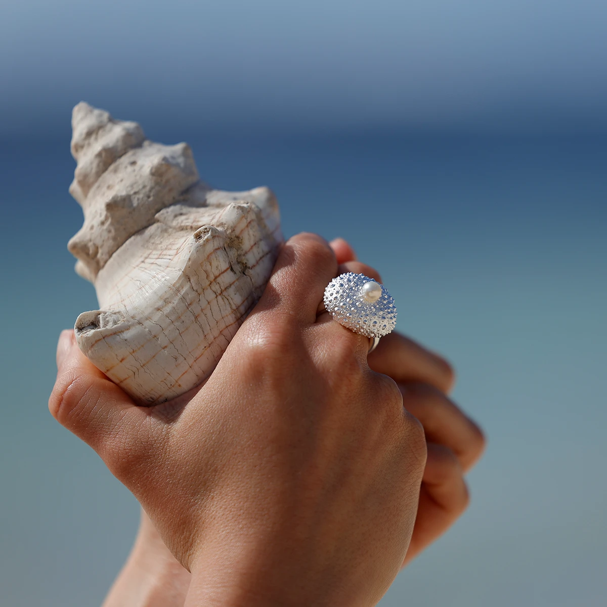 Silver urchin ring with a pearl