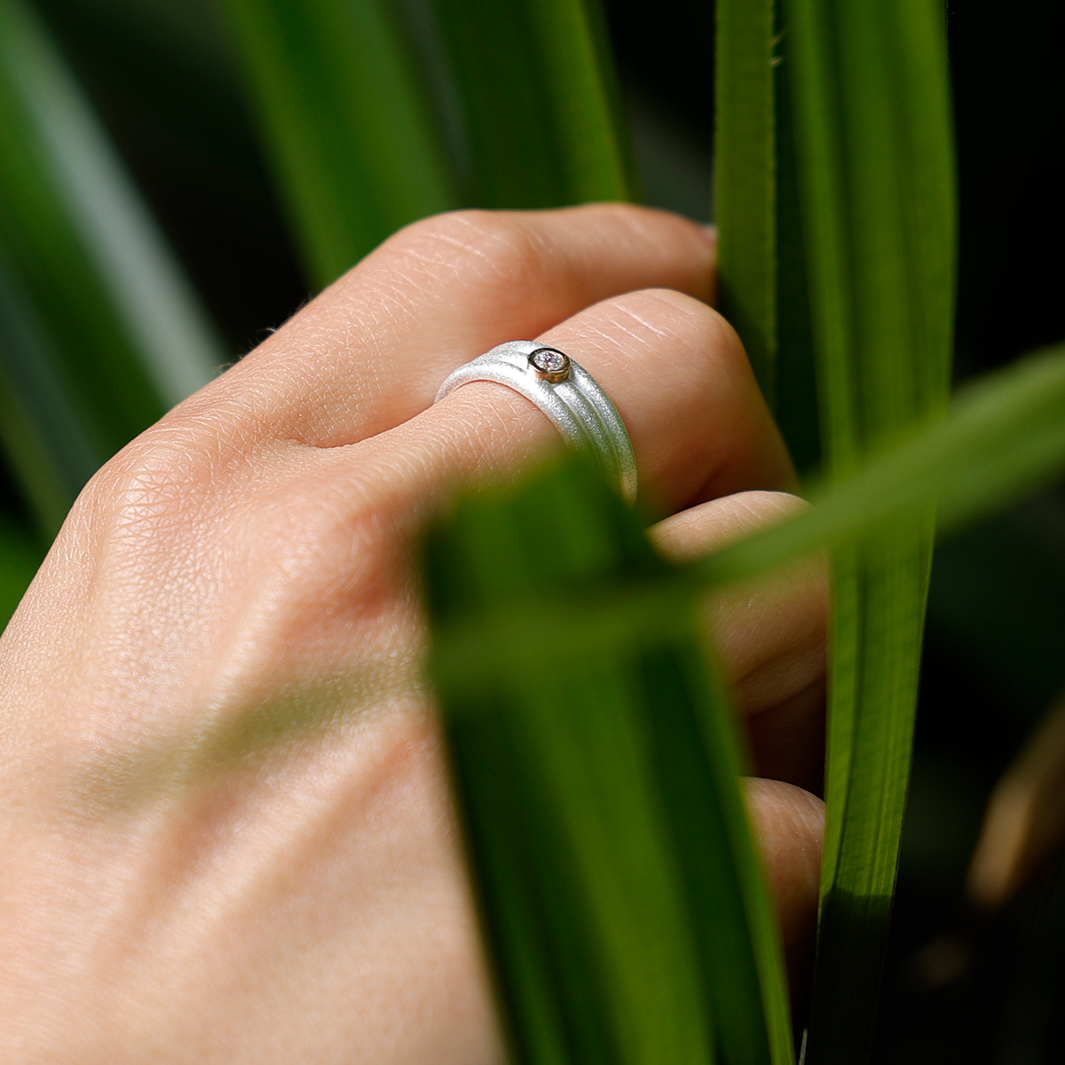 Silver and gold ring with a lab grown diamond
