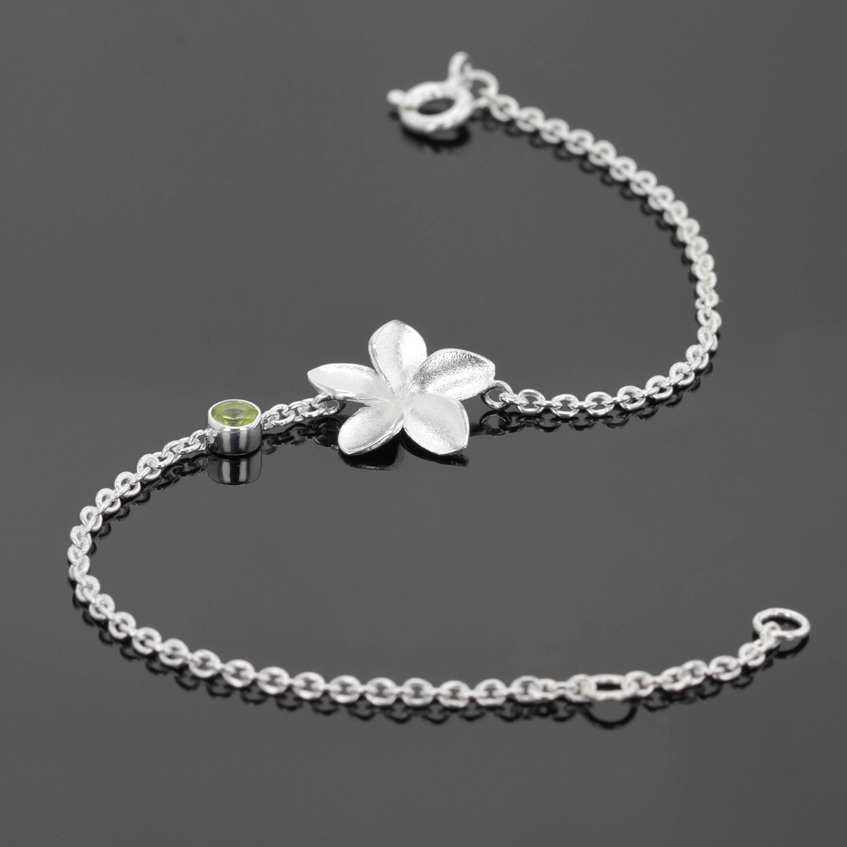 Sterling silver frangipani and gemstone bracelet