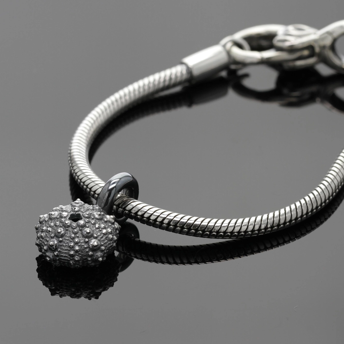 Sea urchin charm in oxidised sterling silver