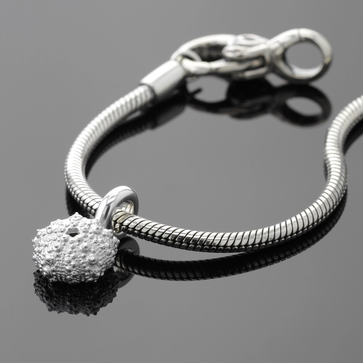Sea urchin charm in sterling silver