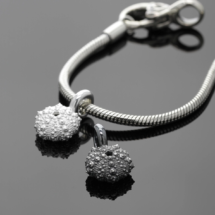 Sea urchin charms in oxidised and naural sterling silver