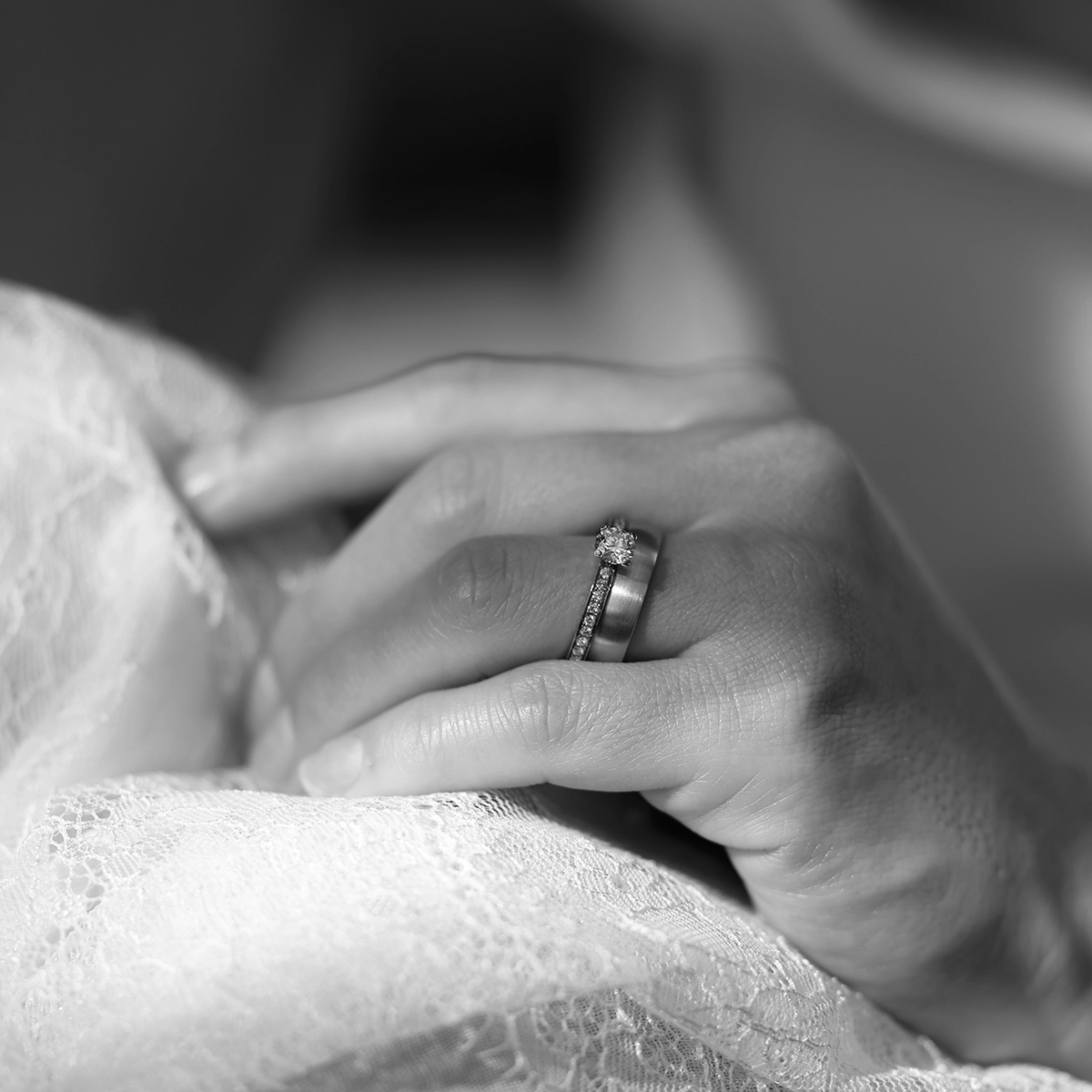 Simple wedding band with diamond engagement ring